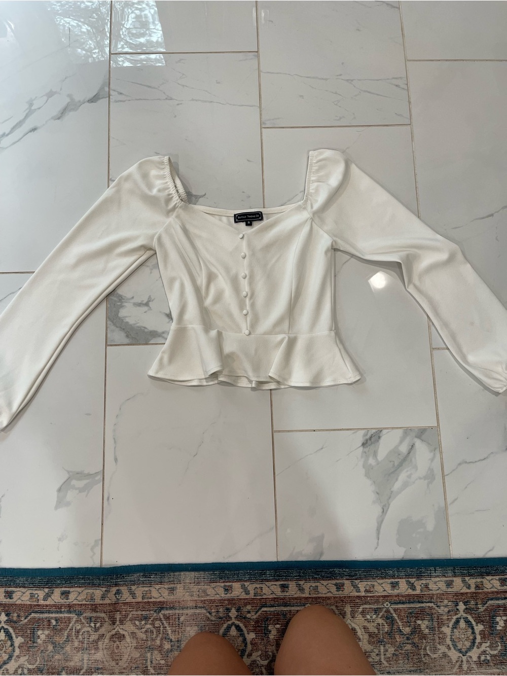 White Long-Sleeve Peplum Top with Button Front